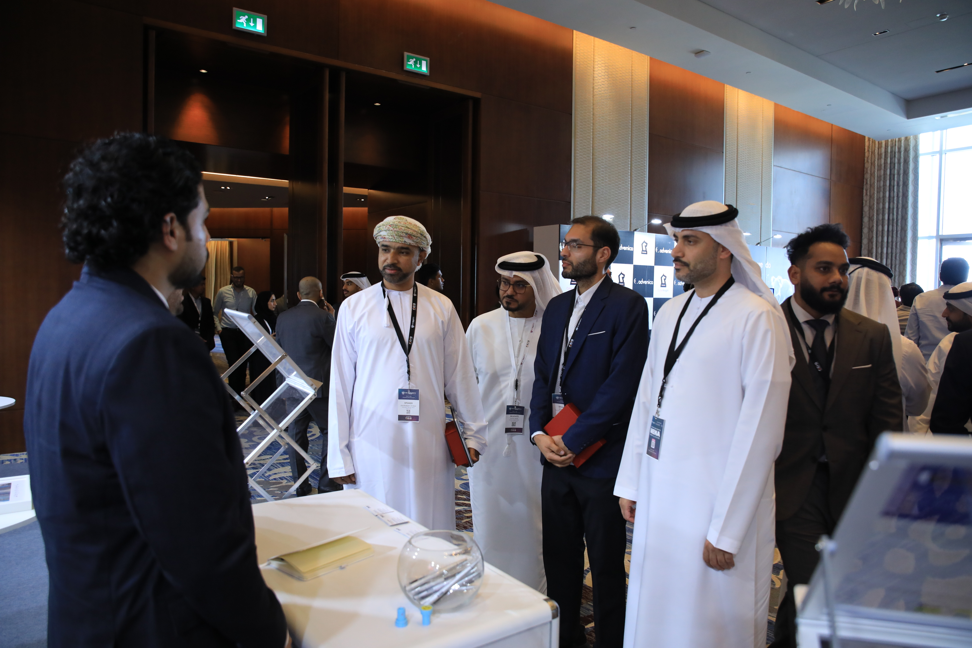 Delegates in conversation between sessions