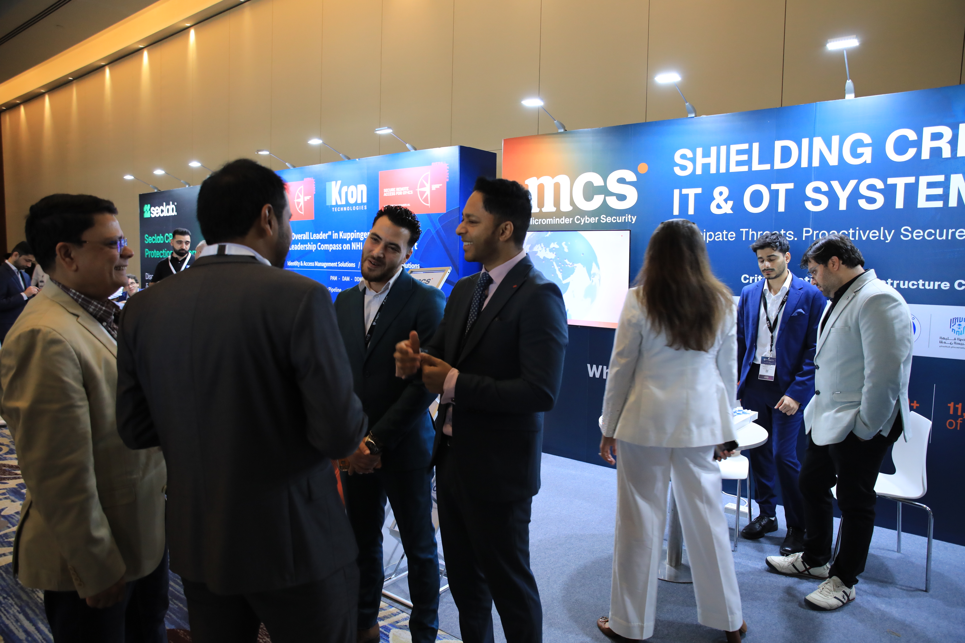 Delegates networking on the exhibition floor